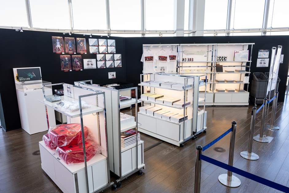 Merchandise featuring original illustrations created specifically for this exhibition is on display
