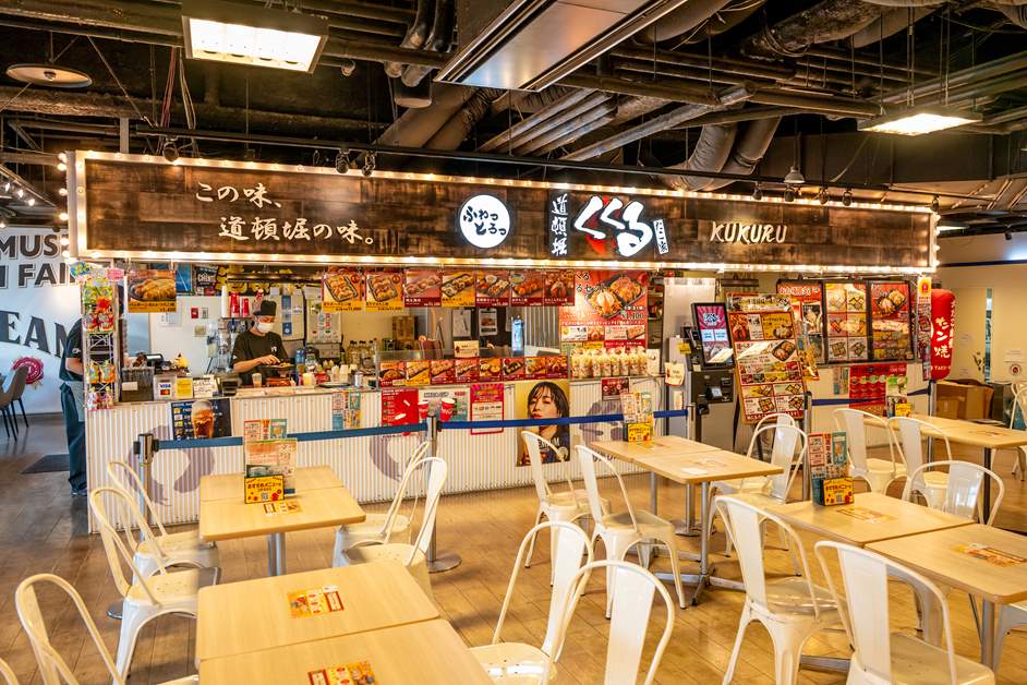 道頓堀的總店以那塊巨大的章魚招牌而聞名